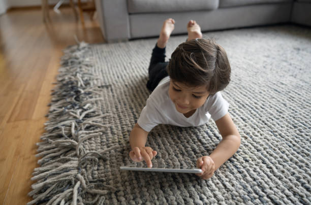 Girl lying on rug | The Design House