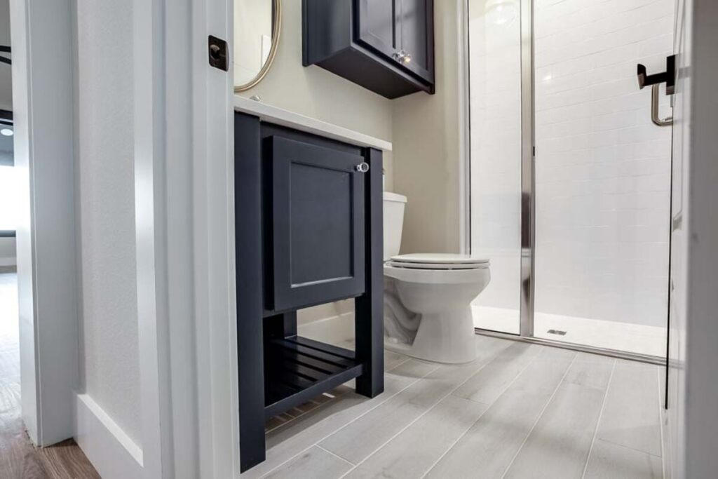 navy vanity quartz countertop bathroom tile flower mound tx.jpg | The Design House