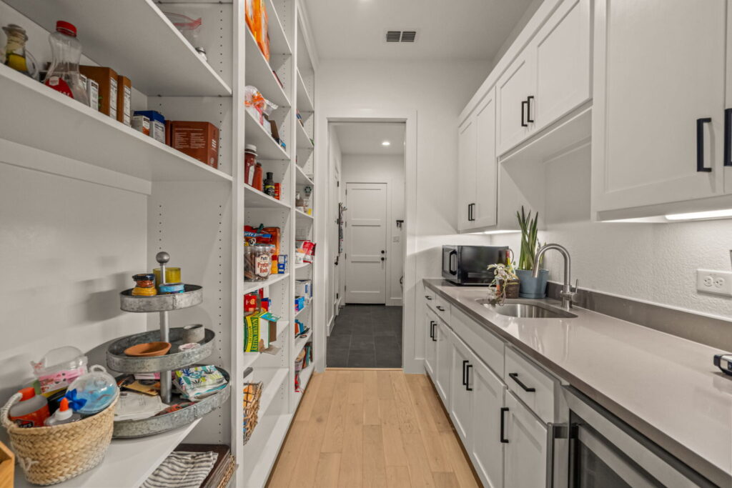walkin pantry white cabinets hardwood flooring plano.jpg | The Design House