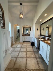 Master bathroom remodel tile patterned flooring farmhouse style