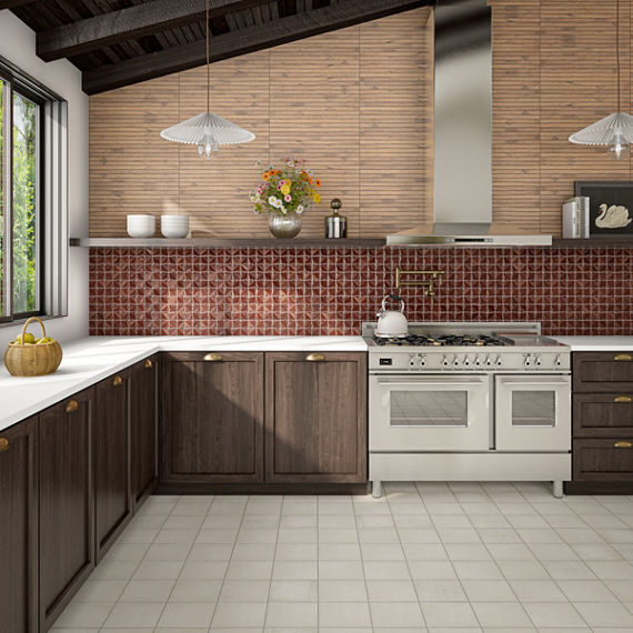 A rustic kitchen featuring a reddish-brown textured tile backsplash, dark wood cabinets with white countertops, a stainless steel range, and light square floor tiles under an angled wooden ceiling.