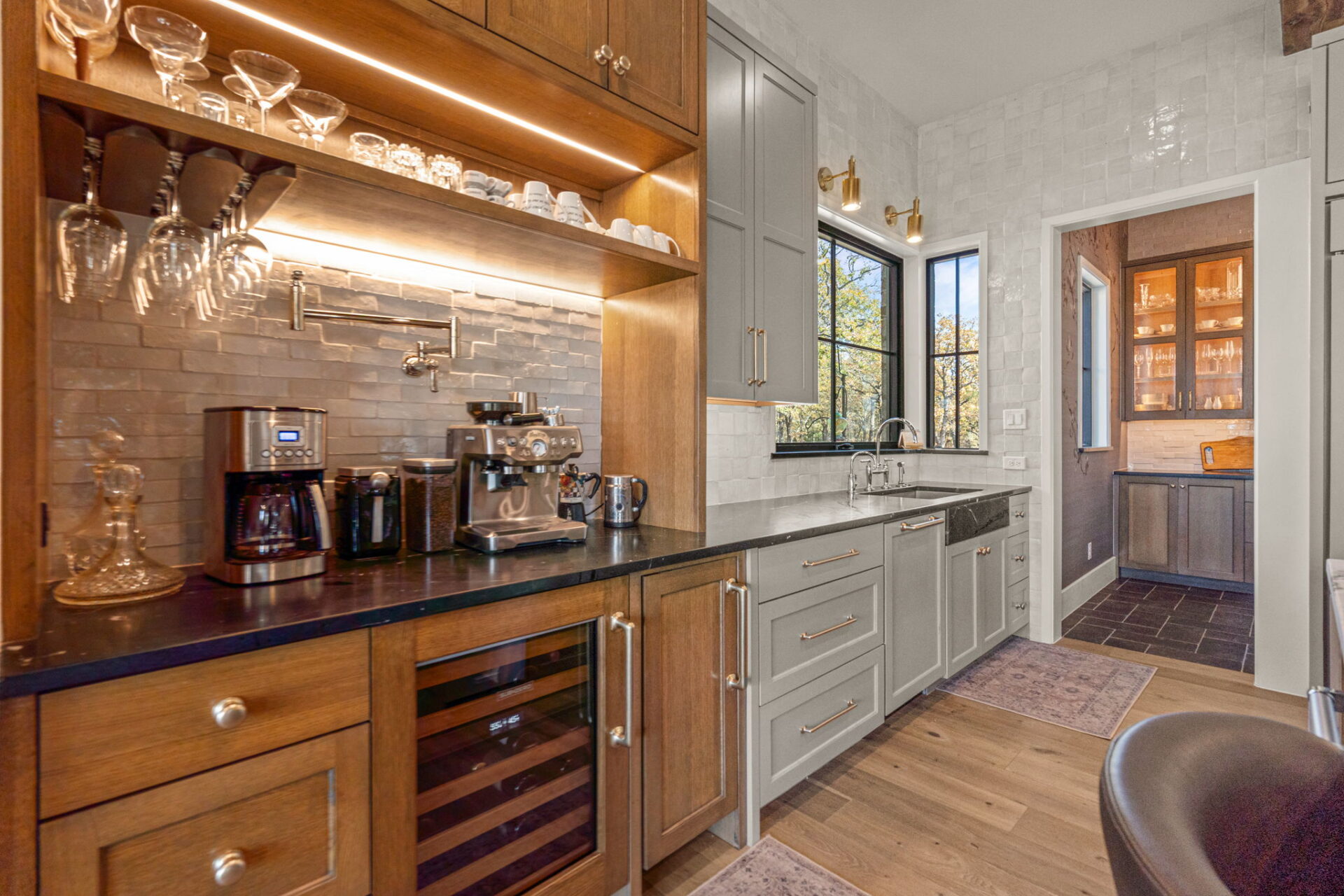 dfw luxury kitchen bar coffee station wine fridge custom cabninetry textured tile backsplash woodblack satin countertops | The Design House