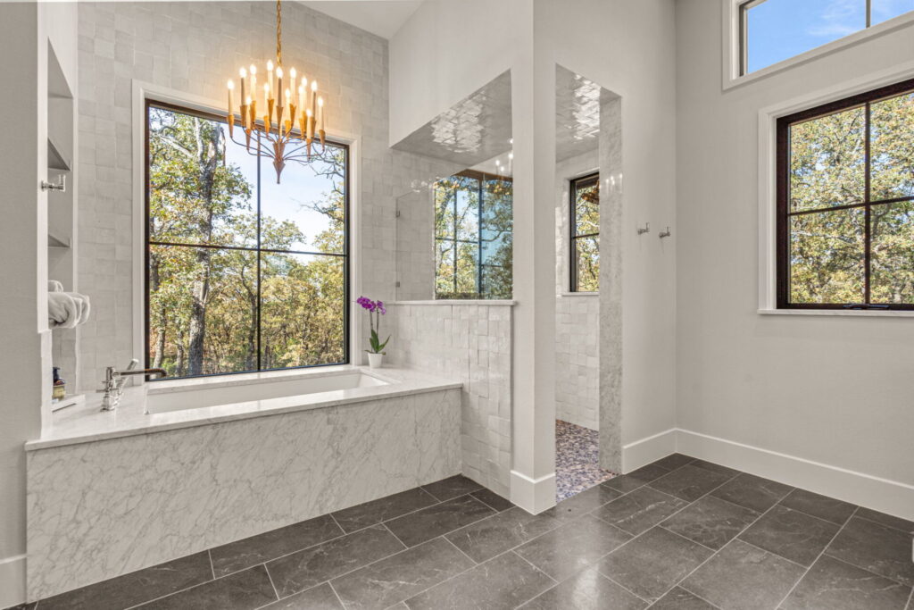 dfw master bathroom soaking tub marble shower white walk in shower | The Design House